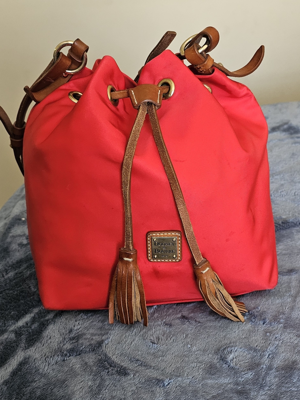 Dooney & Bourke Red Drawstring Bucket Bag with Brown Leather Trim